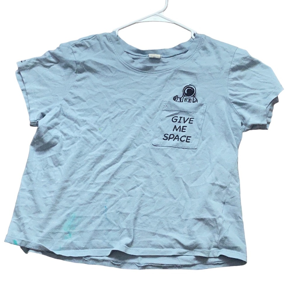 A large blue kids/teens shirt